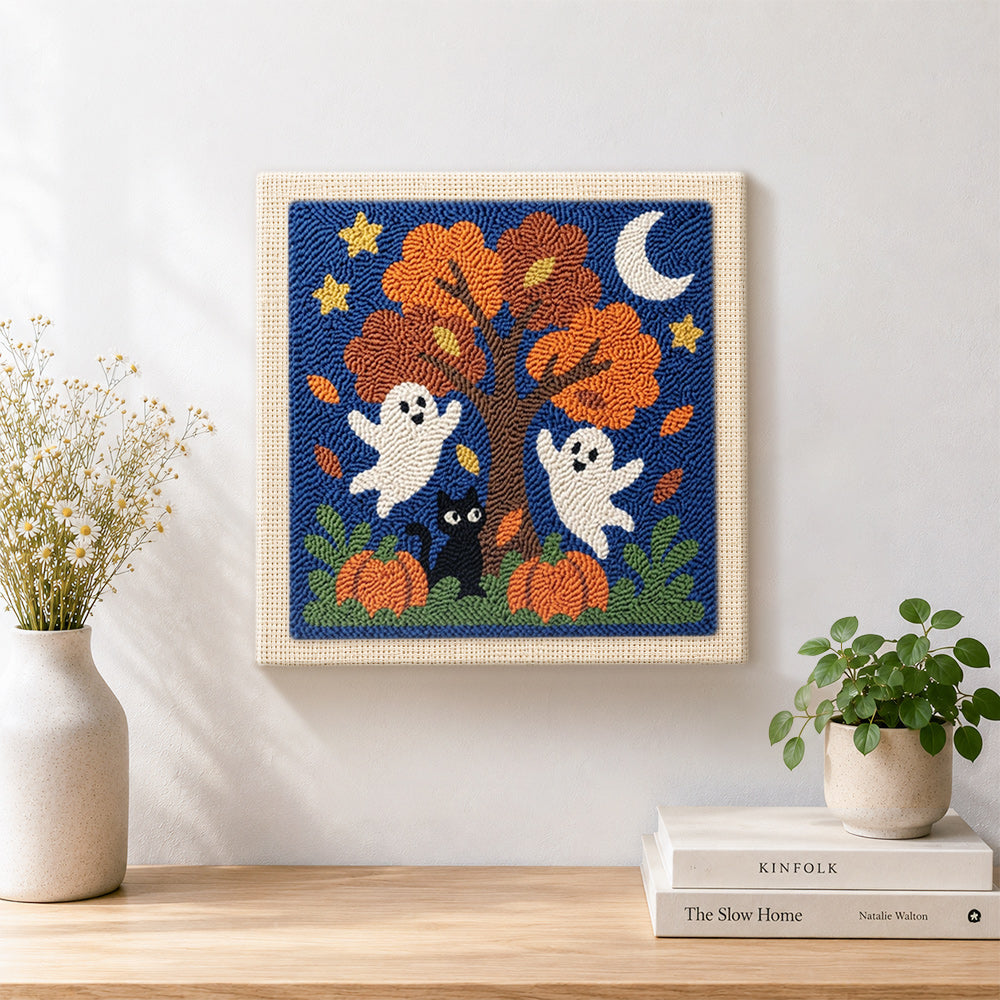 Finished fall tree ghosts artwork displayed on a wall
