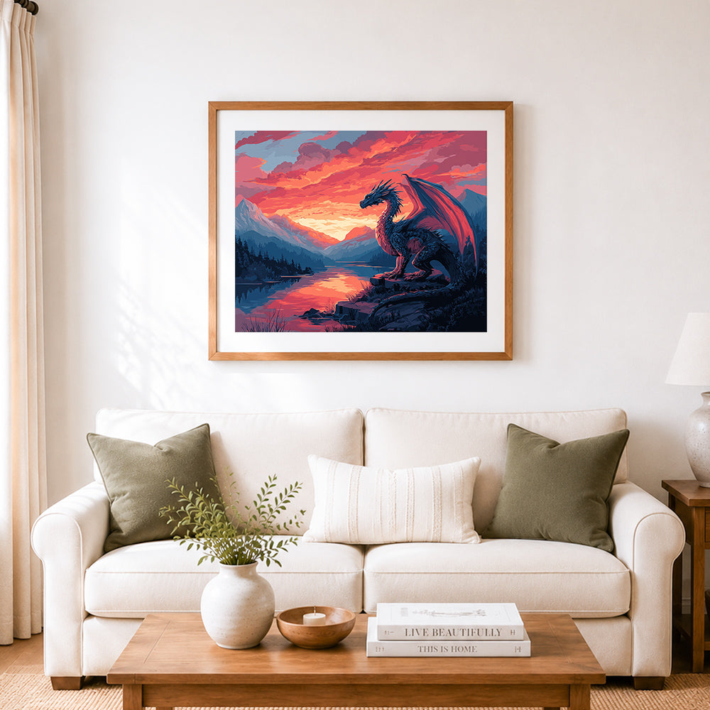 Finished fantasy dragon at sunset in mountain lake cross stitch artwork displayed as home decor
