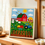 Farmyard animals and carrot field punch needle artwork displayed on a table