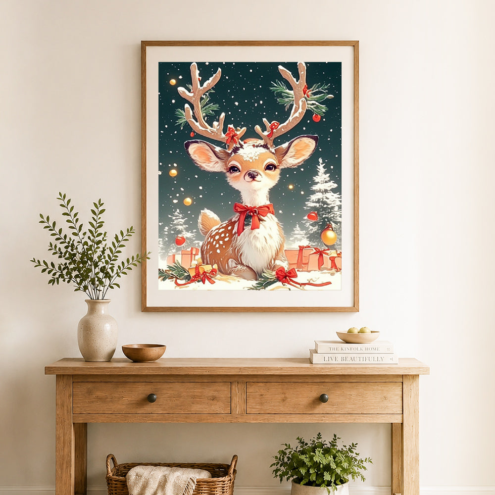 Finished festive baby deer cross stitch artwork displayed as home decor
