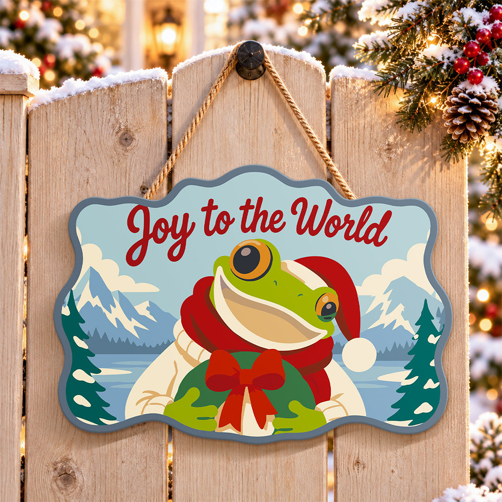 Festive frog greeting paint by numbers door hanger on a garden gate