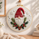 Festive gnome portrait embroidery hoop wall art displayed as warm and cozy handmade home decor