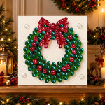 Finished festive holiday wreath pearl diamond painting artwork displayed as holiday home decor