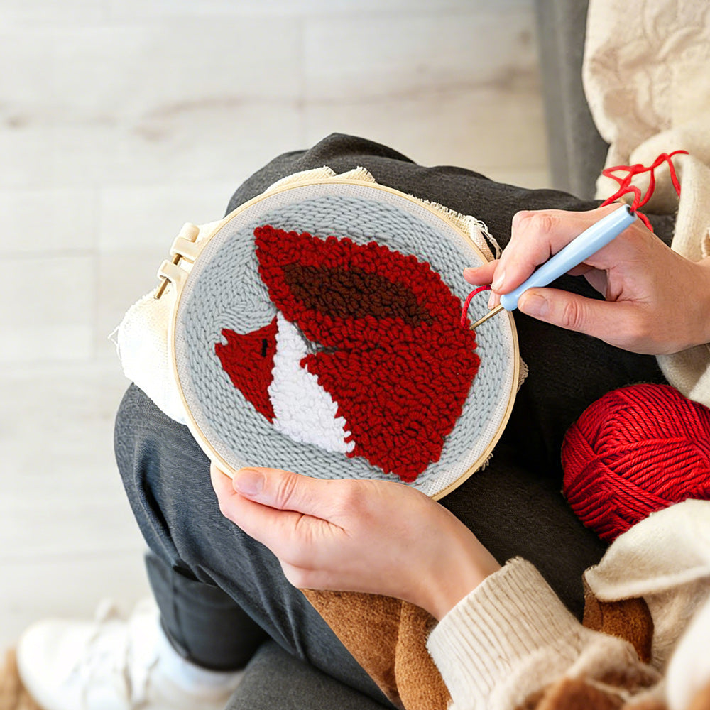 Creating handmade fiery red fox punch needle artwork