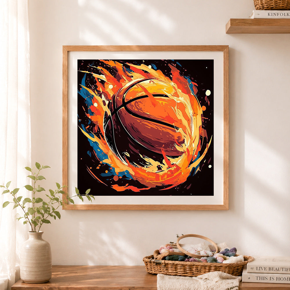 Finished flaming basketball in motion cross stitch artwork displayed as home decor