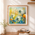 Finished floating dandelion seeds cross stitch artwork displayed as home decor