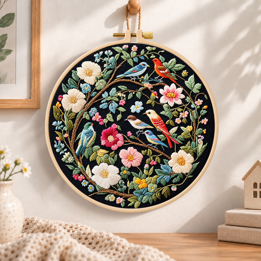 Floral birds on branches embroidery hoop wall art displayed as warm and cozy handmade home decor