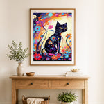 Finished floral black cat art cross stitch artwork displayed as home decor