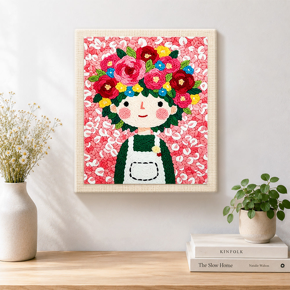 Finished floral crown girl and pink flowers artwork displayed on a wall