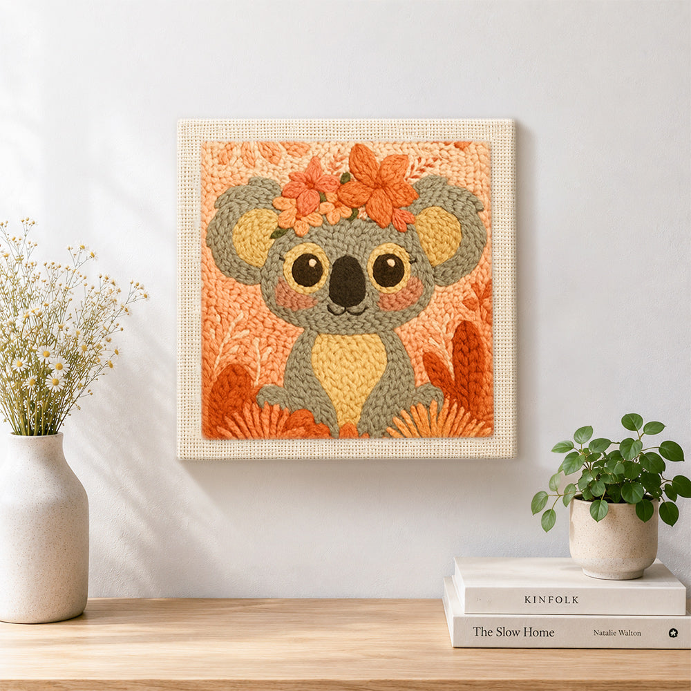 Finished floral crown koala artwork displayed on a wall