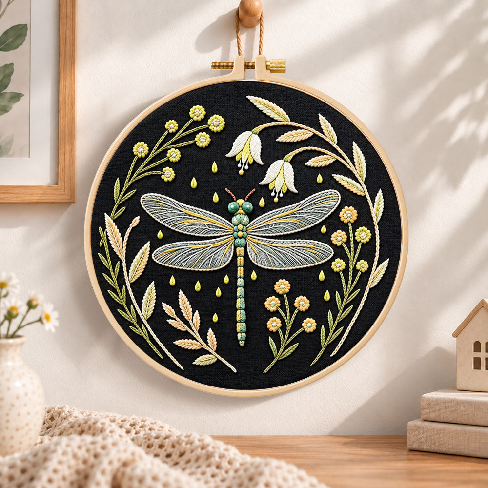 Floral dragonfly embroidery hoop wall art displayed as warm and cozy handmade home decor