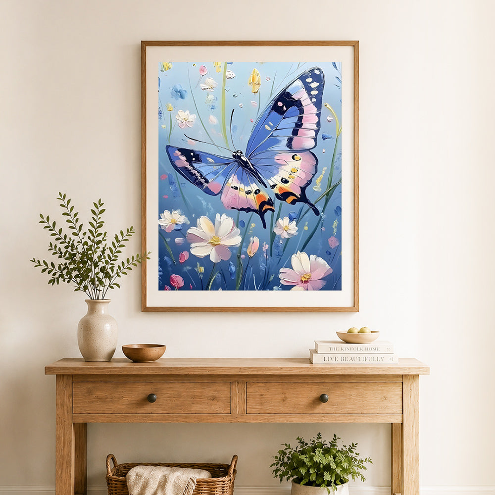 Finished floral garden blue butterfly cross stitch artwork displayed as home decor