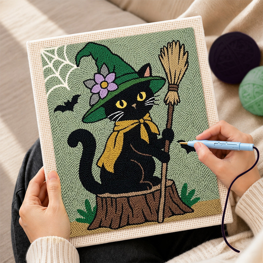 Creating handmade floral‑hat witch cat with broom punch needle artwork