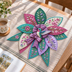 Floral hummingbird handmade quilted bow displayed on a table as seasonal home decor