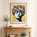 Finished floral mind cross stitch artwork displayed as home decor