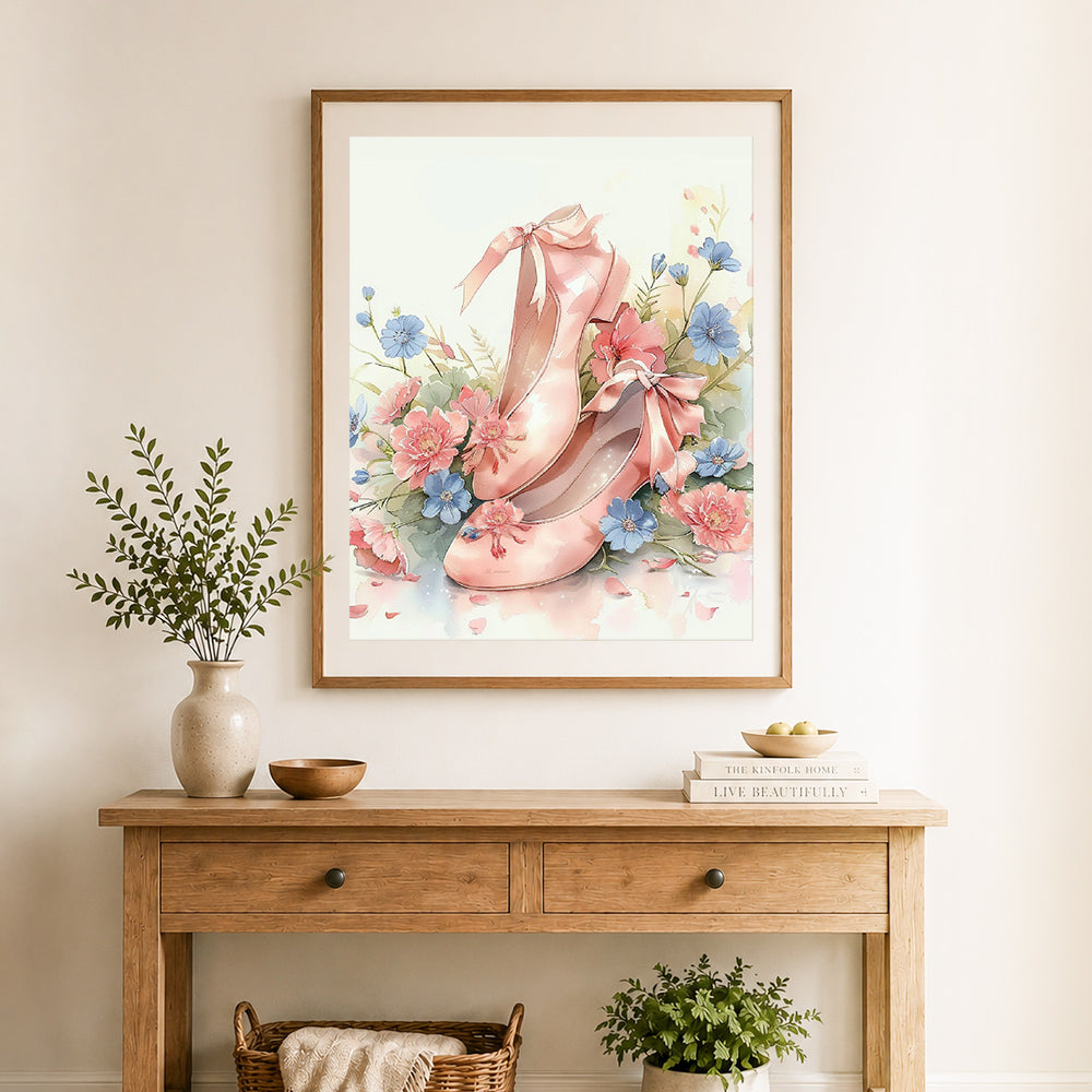 Finished floral pink high heels cross stitch artwork displayed as home decor
