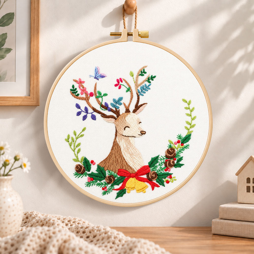 Floral reindeer art embroidery hoop wall art displayed as warm and cozy handmade home decor