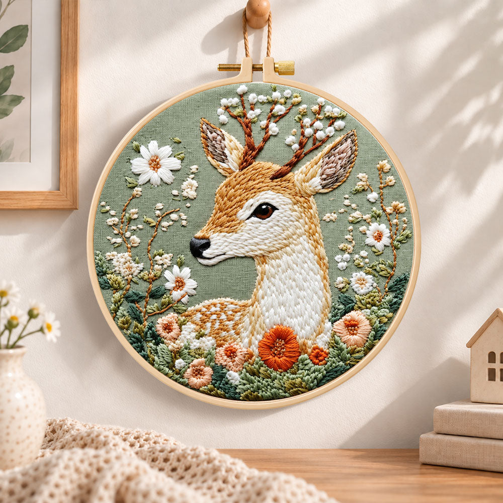Floral sika deer embroidery hoop wall art displayed as warm and cozy handmade home decor