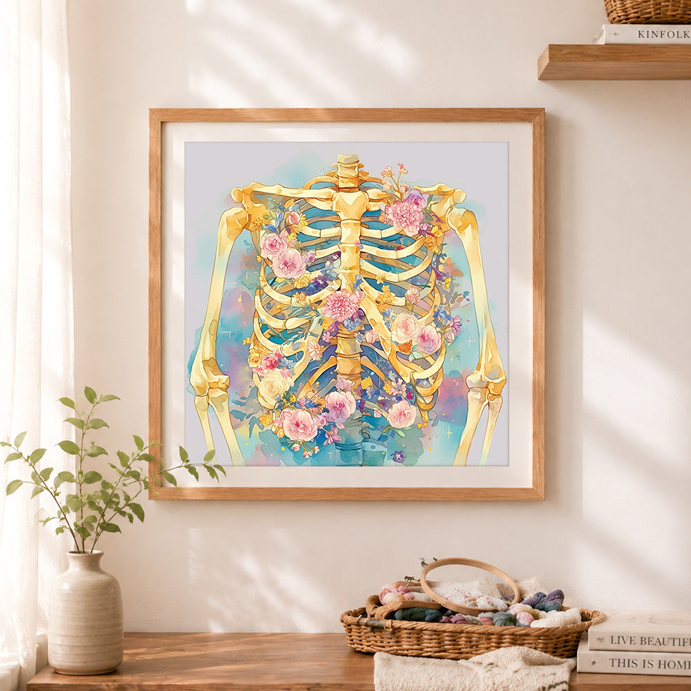Finished floral skeleton art cross stitch artwork displayed as home decor
