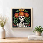 Finished floral skeleton artwork displayed on a wall