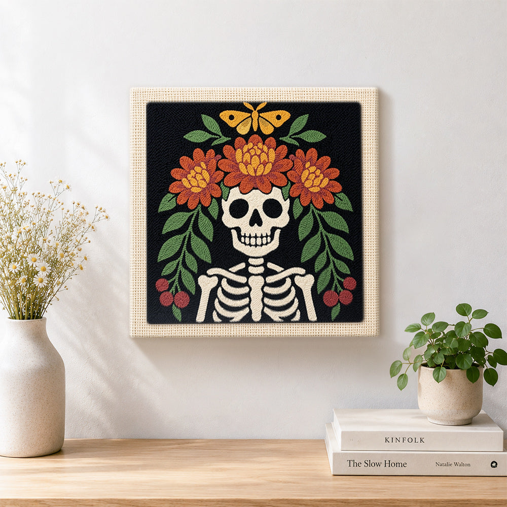 Finished floral skeleton artwork displayed on a wall