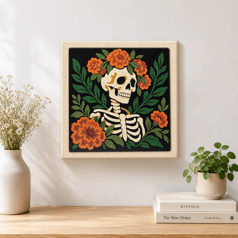 Finished floral skeleton side view artwork displayed on a wall