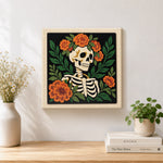 Finished floral skeleton side view artwork displayed on a wall