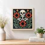 Finished floral skeleton with sunflowers artwork displayed on a wall