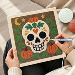 Creating handmade floral sugar skull punch needle artwork