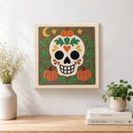 Finished floral sugar skull artwork displayed on a wall