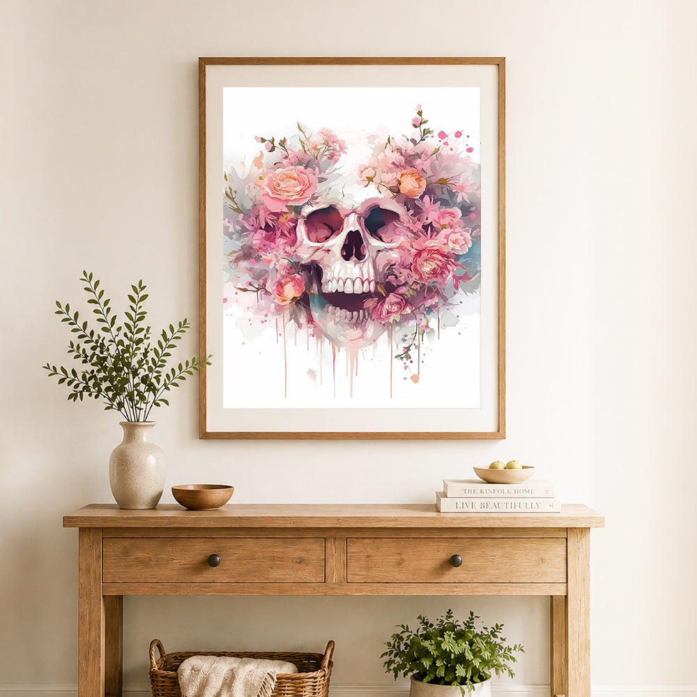 Finished floral watercolor skull cross stitch artwork displayed as home decor