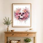 Finished floral watercolor skull cross stitch artwork displayed as home decor