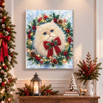 Finished fluffy cat in holly wreath pearl diamond painting artwork displayed as holiday home decor