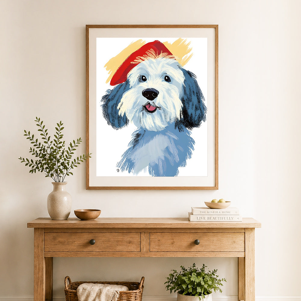 Finished fluffy dog with red beret cross stitch artwork displayed as home decor