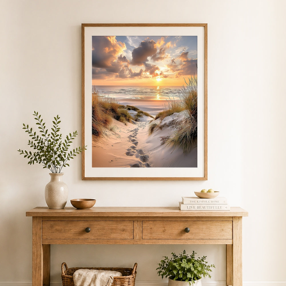 Finished footprints on sand dunes at sunset cross stitch artwork displayed as home decor