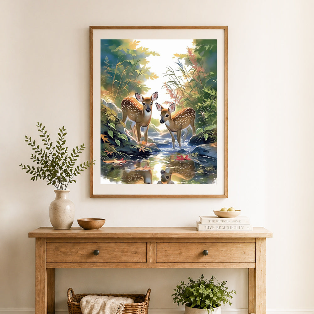 Finished forest stream baby deer cross stitch artwork displayed as home decor
