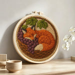 Fox in the basket punch needle artwork displayed on a table