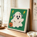 Frankenstein ghost punch needle artwork displayed on a table