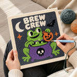 Creating handmade frog brew crew punch needle artwork