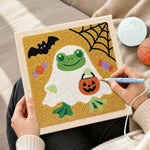 Creating handmade frog ghost in disguise punch needle artwork