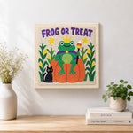 Finished frog or treat artwork displayed on a wall