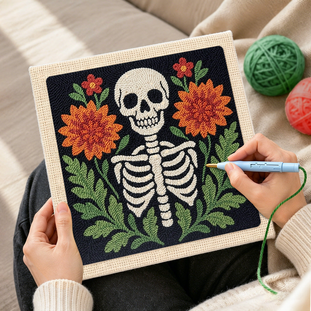 Creating handmade front‑facing floral skeleton punch needle artwork