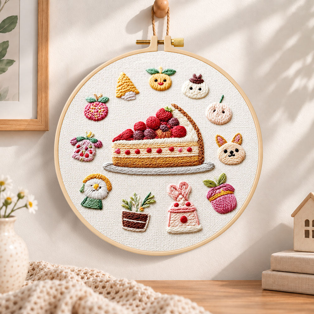Fruit pie and whimsical motifs embroidery hoop wall art displayed as warm and cozy handmade home decor
