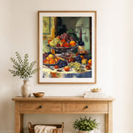 Finished fruit still life with wine and grapes cross stitch artwork displayed as home decor