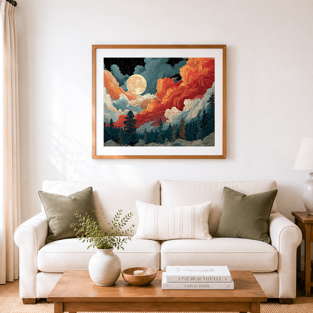 Finished full moon above colorful cloud forest cross stitch artwork displayed as home decor