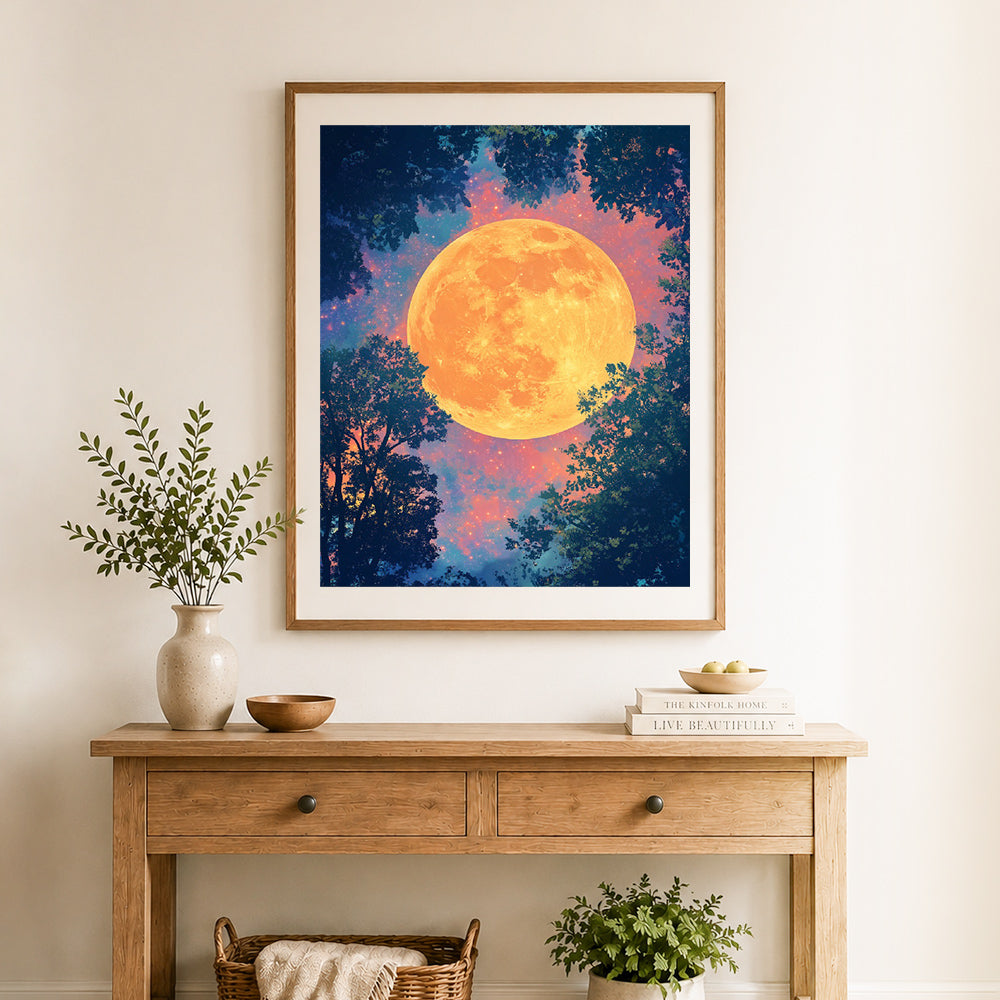 Finished full moon through tree canopy cross stitch artwork displayed as home decor