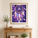 Finished galaxy dreamcatcher cross stitch artwork displayed as home decor