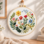 Garden floral hand embroidery hoop wall art displayed as warm and cozy handmade home decor