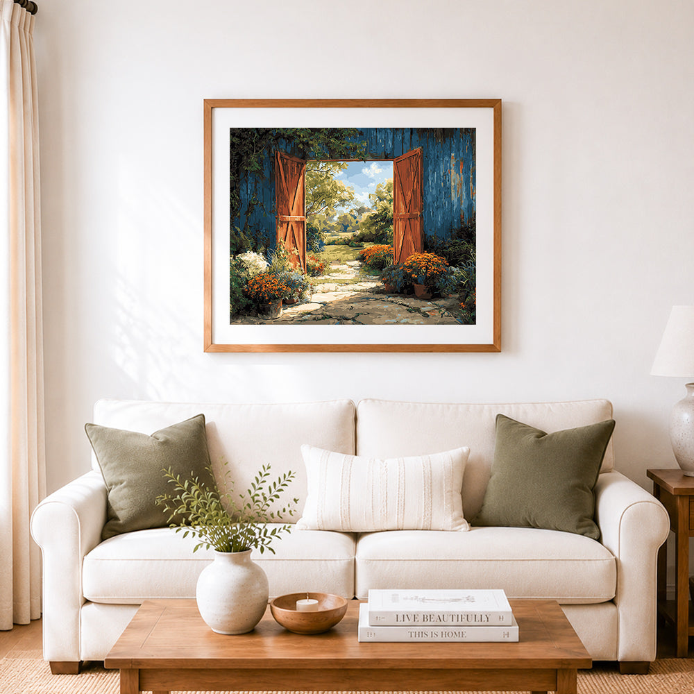 Finished garden gate in summer cross stitch artwork displayed as home decor