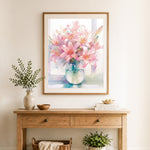 Finished gentle pink lily cross stitch artwork displayed as home decor